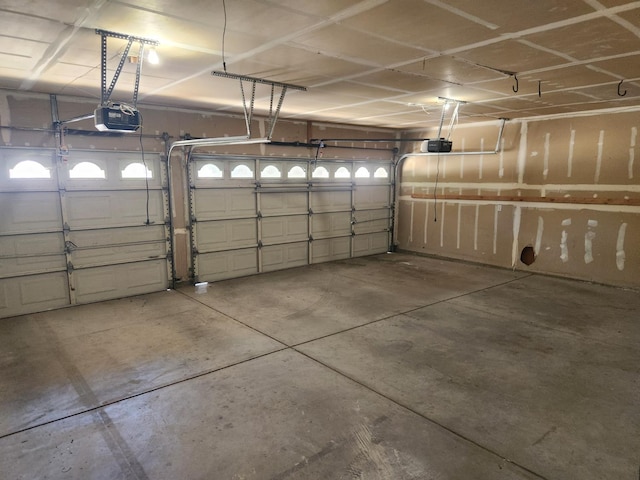9063 N Woodrow Ave, Fresno, CA 93720 - garage featuring a garage door opener