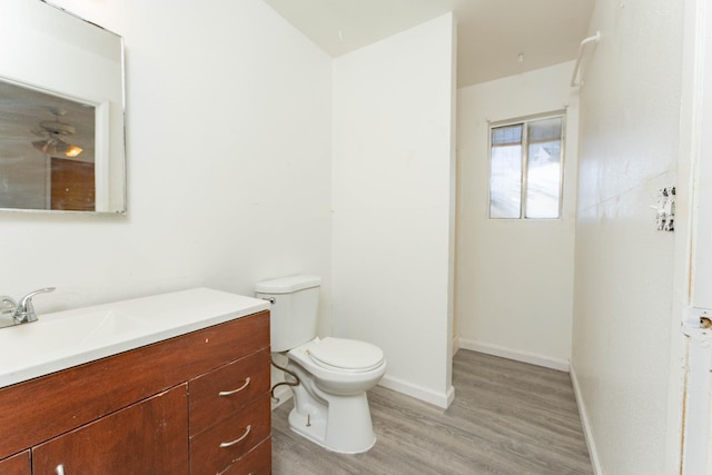 603 E Compton Ave, Pixley, CA 93256 - bathroom featuring wood finished floors and vanity