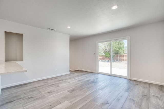 5276 N 1st St, Fresno, CA 93710 - unfurnished room with light wood-style flooring and recessed lighting