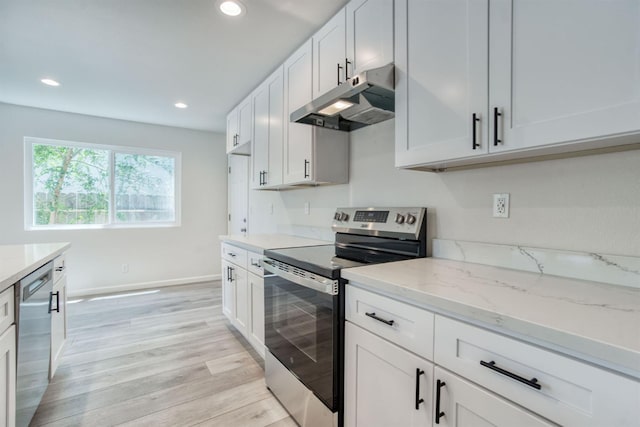 5276 N 1st St, Fresno, CA 93710 - kitchen featuring stainless steel appliances, under cabinet range hood, light wood-style flooring, light stone counters, and recessed lighting