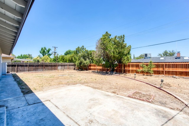 5276 N 1st St, Fresno, CA 93710 - fenced backyard featuring a patio area