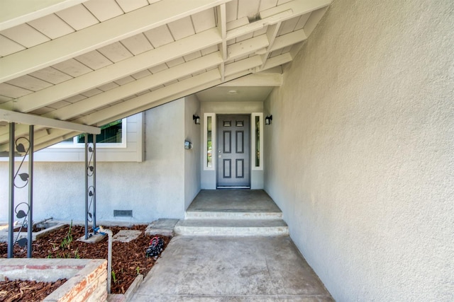 5276 N 1st St, Fresno, CA 93710 - entrance to property featuring stucco siding and crawl space
