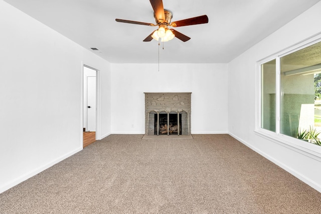 4759 E Vassar Ave, Fresno, CA 93703 - unfurnished living room featuring a ceiling fan, carpet, and a fireplace