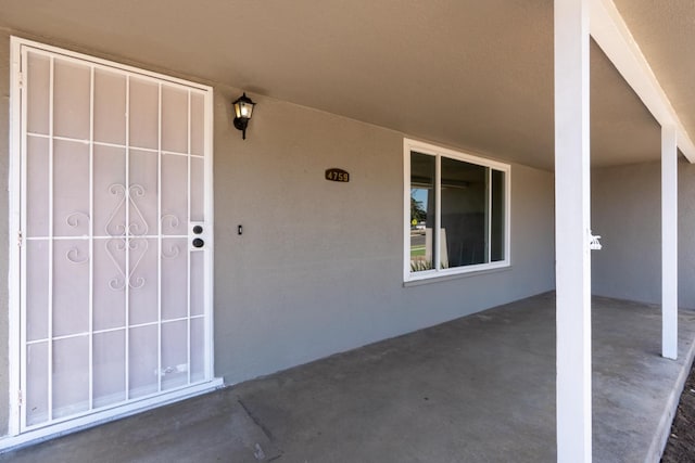 4759 E Vassar Ave, Fresno, CA 93703 - entrance to property featuring stucco siding and a patio