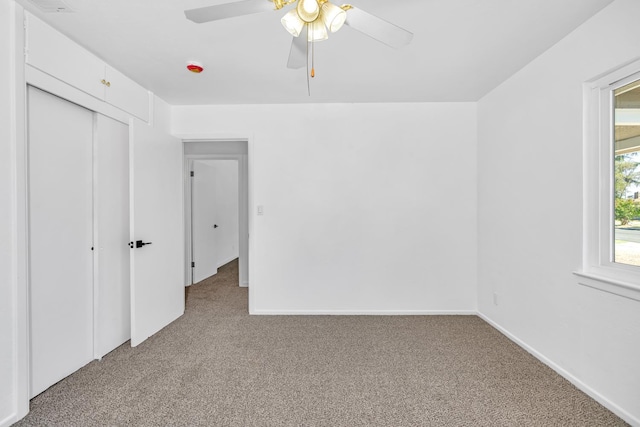 4759 E Vassar Ave, Fresno, CA 93703 - unfurnished bedroom featuring light colored carpet, ceiling fan, and a closet