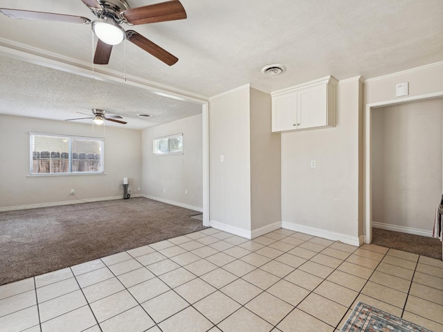 3672 N Shirley Ave, Fresno, CA 93727 - empty room with light carpet, ceiling fan, and a textured ceiling