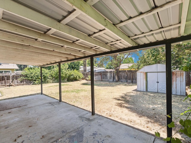 3672 N Shirley Ave, Fresno, CA 93727 - fenced backyard featuring a storage shed and a patio area