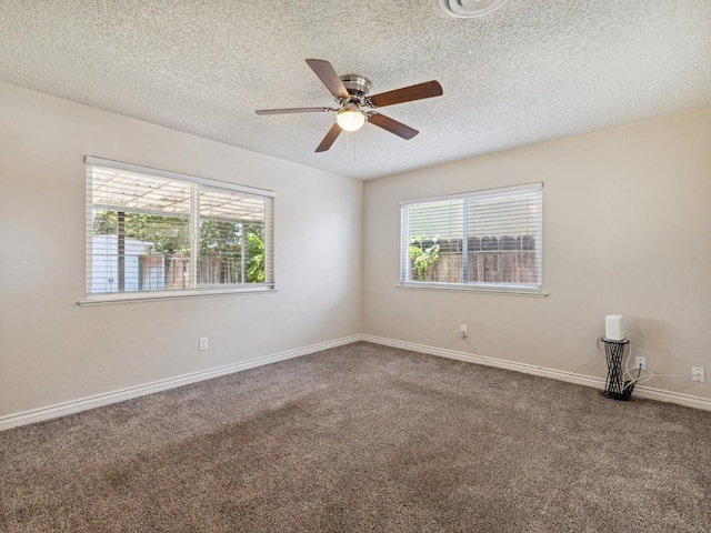 3672 N Shirley Ave, Fresno, CA 93727 - carpeted empty room featuring plenty of natural light, a ceiling fan, and a textured ceiling