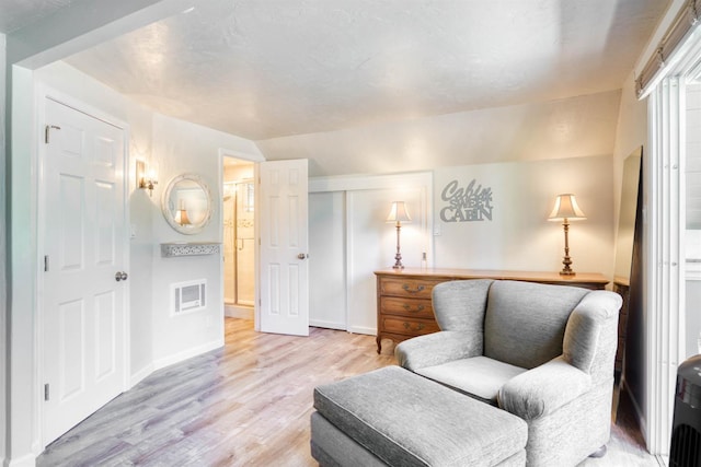 42198 Smoke Tree, Shaver Lake, CA 93664 - living area featuring light wood finished floors and lofted ceiling
