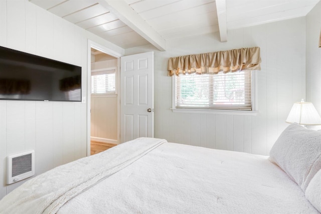 42198 Smoke Tree, Shaver Lake, CA 93664 - bedroom with multiple windows, heating unit, beamed ceiling, and wood walls