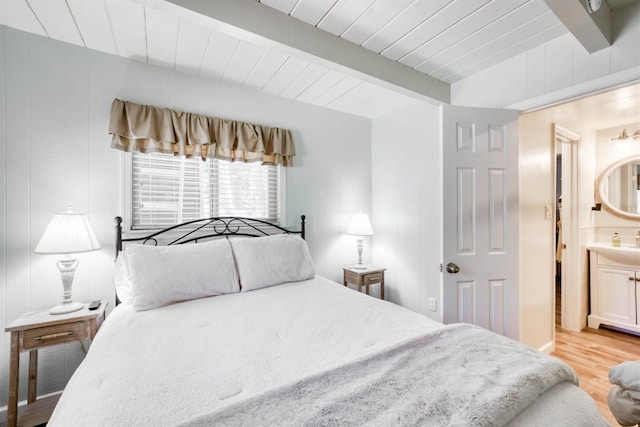 42198 Smoke Tree, Shaver Lake, CA 93664 - bedroom with light wood finished floors, a wood ceiling with exposed beams, and ensuite bath