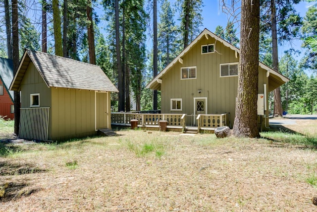 42198 Smoke Tree, Shaver Lake, CA 93664 - back of property with a wooden deck and a storage shed