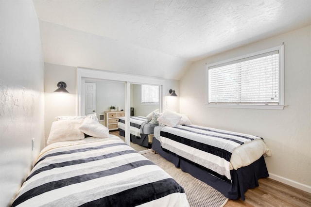42198 Smoke Tree, Shaver Lake, CA 93664 - bedroom with lofted ceiling and wood finished floors