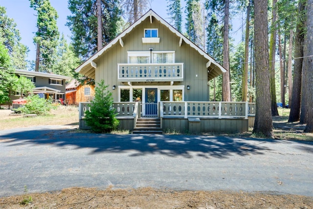 42198 Smoke Tree, Shaver Lake, CA 93664 - view of front of house featuring a wooden deck and a balcony