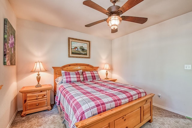 42052 Granite Ridge Rd, Shaver Lake, CA 93664 - bedroom with light colored carpet and ceiling fan