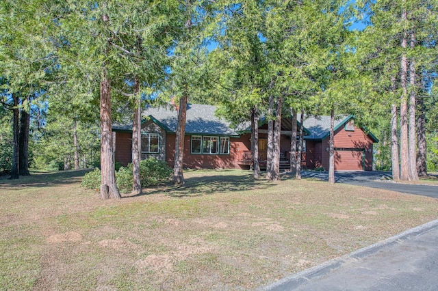 42052 Granite Ridge Rd, Shaver Lake, CA 93664 - view of front of home with a front lawn, a garage, and asphalt driveway