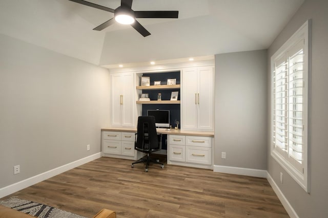 7671 N Ricewood Ave, Fresno, CA 93711 - home office featuring built in study area, ceiling fan, lofted ceiling, healthy amount of natural light, and wood finished floors