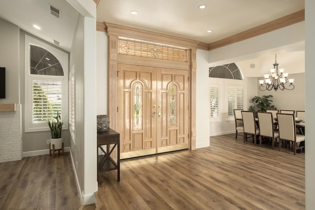 7671 N Ricewood Ave, Fresno, CA 93711 - entryway featuring wood finished floors, crown molding, a chandelier, and recessed lighting