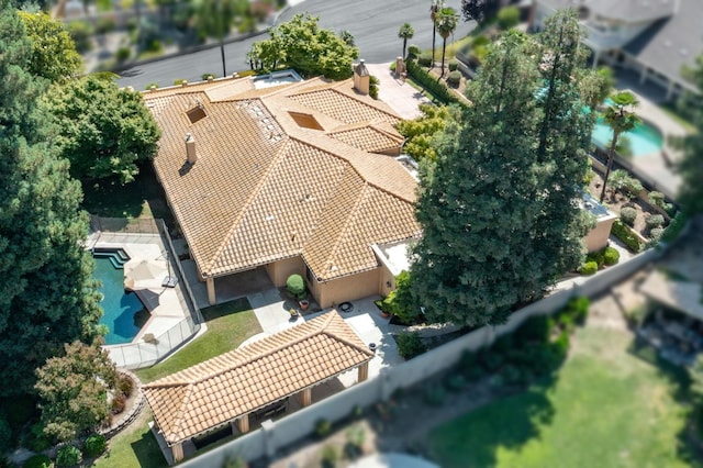 7671 N Ricewood Ave, Fresno, CA 93711 - aerial view of property and surrounding area with a pool area