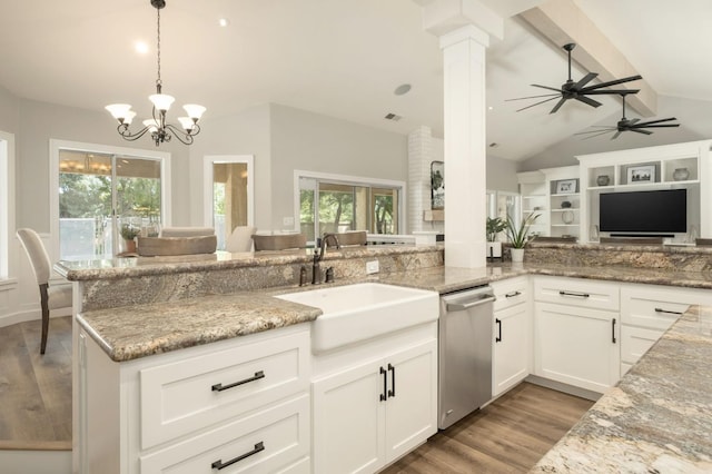 7671 N Ricewood Ave, Fresno, CA 93711 - kitchen featuring dishwasher, open floor plan, light wood finished floors, light stone counters, and healthy amount of natural light