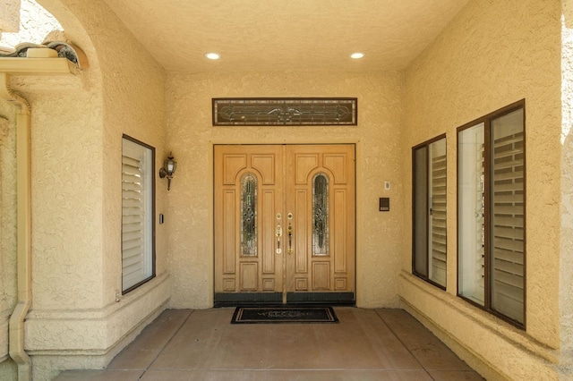 7671 N Ricewood Ave, Fresno, CA 93711 - doorway to property with stucco siding