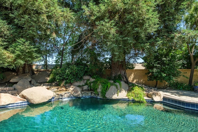 7671 N Ricewood Ave, Fresno, CA 93711 - view of pool featuring a fenced backyard