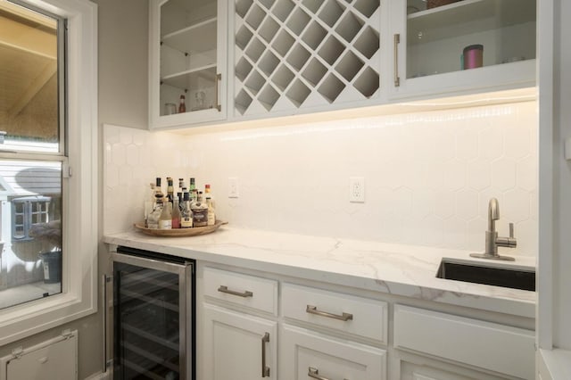 7671 N Ricewood Ave, Fresno, CA 93711 - indoor dry bar with wine cooler and decorative backsplash