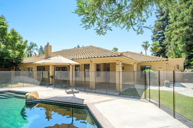 7671 N Ricewood Ave, Fresno, CA 93711 - view of swimming pool with a patio
