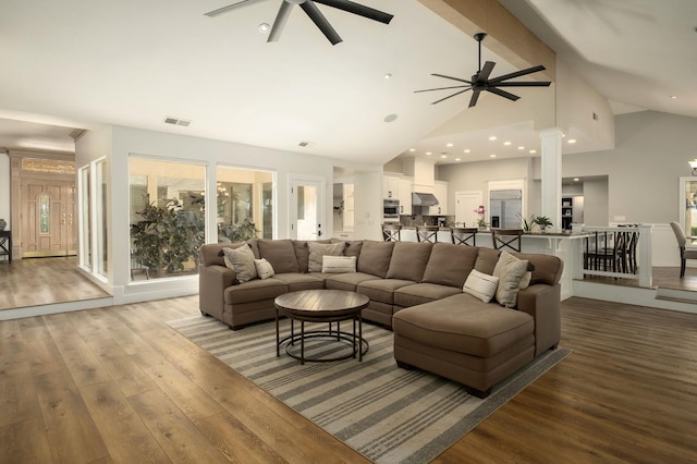7671 N Ricewood Ave, Fresno, CA 93711 - living room with ceiling fan, wood finished floors, high vaulted ceiling, and ornate columns