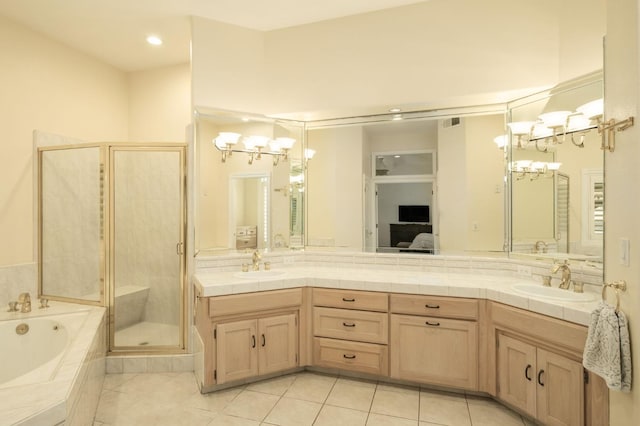 7671 N Ricewood Ave, Fresno, CA 93711 - ensuite bathroom with a stall shower, double vanity, a garden tub, tile patterned floors, and a chandelier