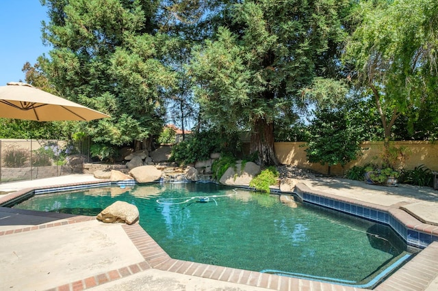 7671 N Ricewood Ave, Fresno, CA 93711 - view of pool with a fenced backyard
