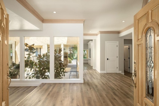 7671 N Ricewood Ave, Fresno, CA 93711 - foyer with crown molding, wood finished floors, and recessed lighting