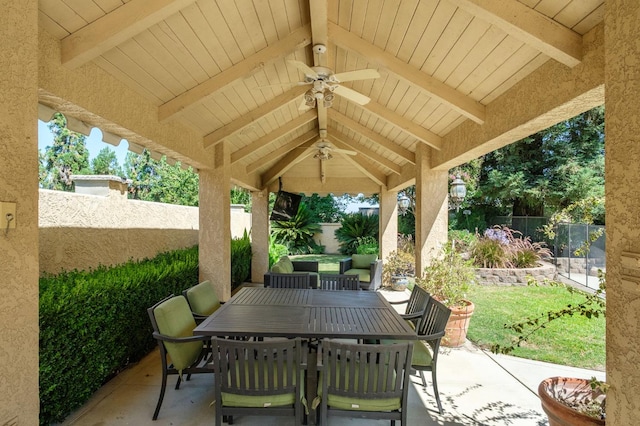 7671 N Ricewood Ave, Fresno, CA 93711 - fenced backyard featuring a ceiling fan, a patio area, outdoor dining area, and a gazebo