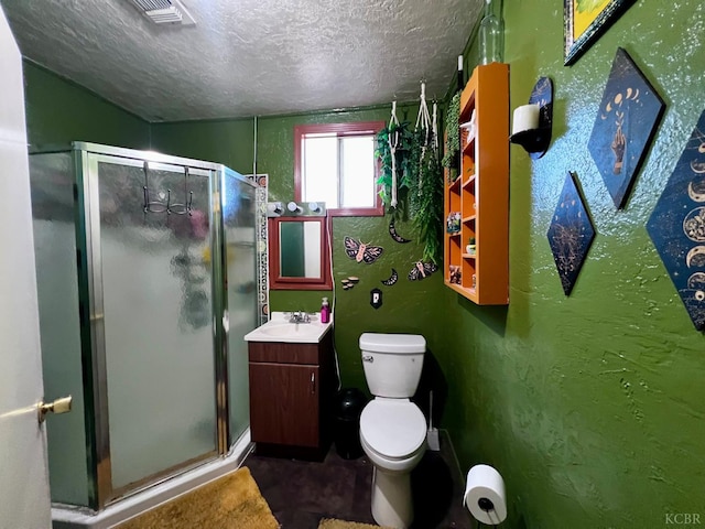 420 E Florinda St, Hanford, CA 93230 - full bathroom with a textured ceiling, vanity, a stall shower, and a textured wall