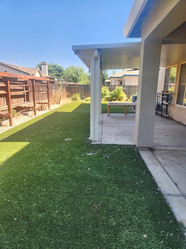 3310 N Jason Ave, Fresno, CA 93737 - fenced backyard featuring a patio area