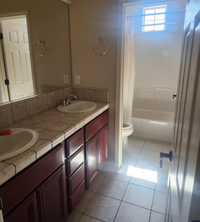 3310 N Jason Ave, Fresno, CA 93737 - full bathroom featuring double vanity, shower / bath combo, and tile patterned floors