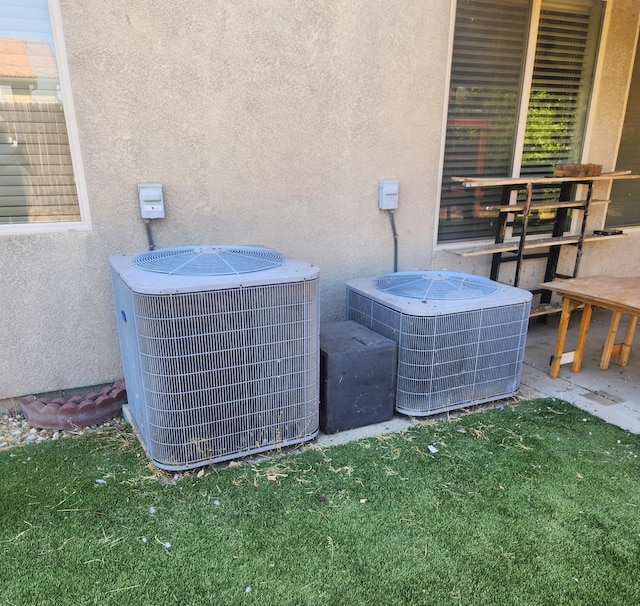3310 N Jason Ave, Fresno, CA 93737 - exterior view of a central air condition unit and stucco siding