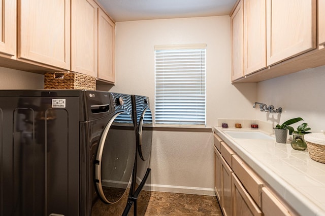 2322 E Revere Rd, Fresno, CA 93720 - laundry area featuring washing machine and clothes dryer and cabinet space