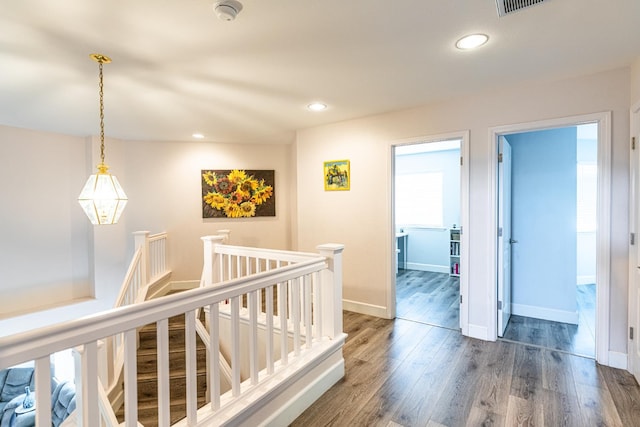 2322 E Revere Rd, Fresno, CA 93720 - hall featuring an upstairs landing, wood finished floors, and recessed lighting