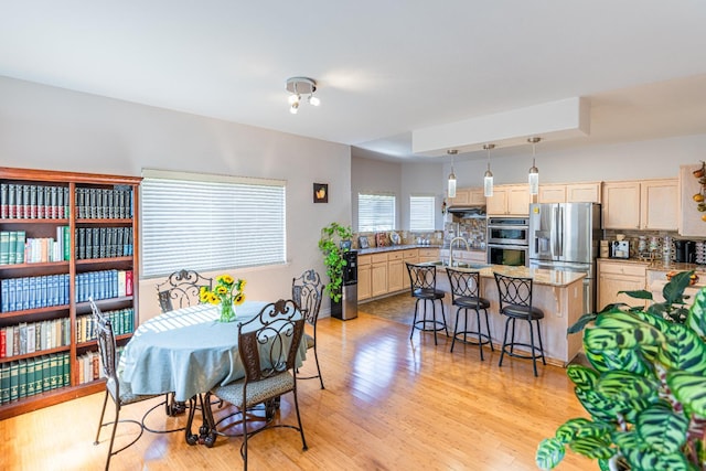 2322 E Revere Rd, Fresno, CA 93720 - dining room with light wood-style floors