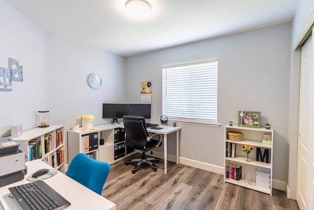 2322 E Revere Rd, Fresno, CA 93720 - office area featuring wood finished floors and baseboards