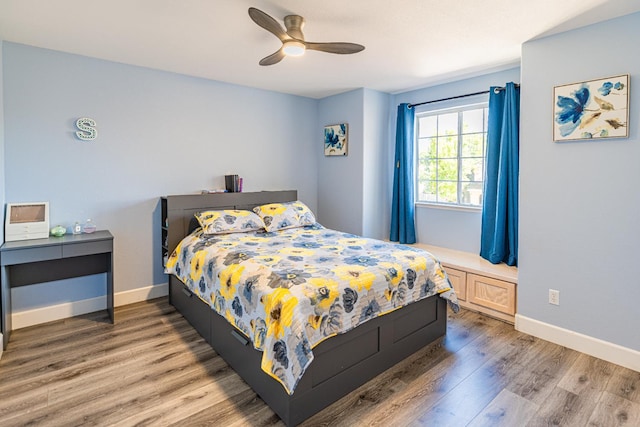2322 E Revere Rd, Fresno, CA 93720 - bedroom with wood finished floors and ceiling fan