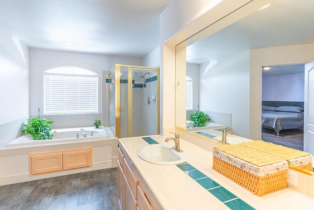 2322 E Revere Rd, Fresno, CA 93720 - full bathroom featuring a bath, a stall shower, vanity, and ensuite bath
