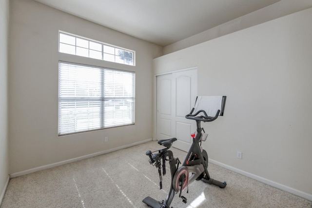 7515 N Wheeler Ave, Fresno, CA 93722 - workout room featuring baseboards and carpet