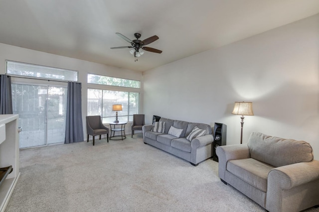 7515 N Wheeler Ave, Fresno, CA 93722 - living area featuring light colored carpet and ceiling fan
