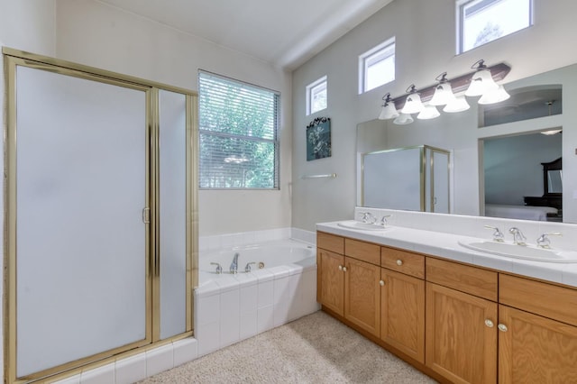 7515 N Wheeler Ave, Fresno, CA 93722 - full bath with a shower stall, double vanity, and a bath