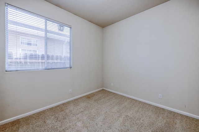 7515 N Wheeler Ave, Fresno, CA 93722 - unfurnished room with carpet and baseboards