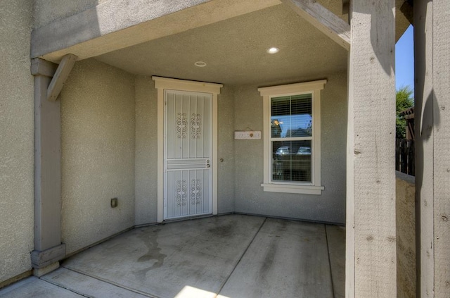 3669 N Clover Ave, Fresno, CA 93727 - doorway to property featuring stucco siding