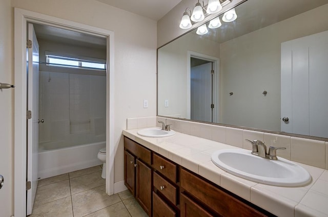 3669 N Clover Ave, Fresno, CA 93727 - bathroom with double vanity, tile patterned floors, and shower / bath combination