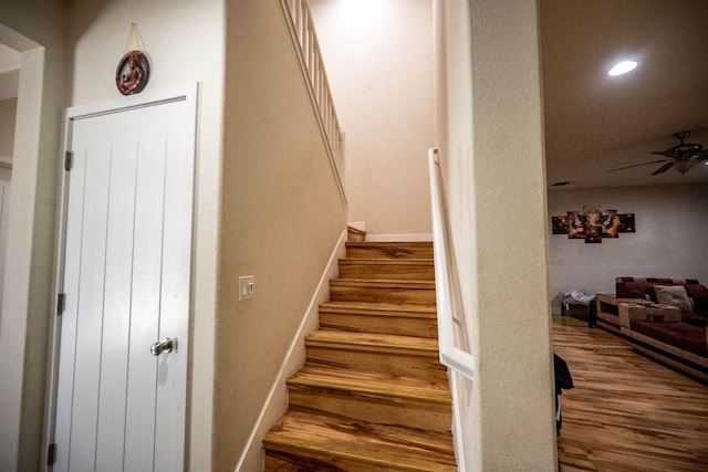 3669 N Clover Ave, Fresno, CA 93727 - stairs with wood finished floors, ceiling fan, and recessed lighting